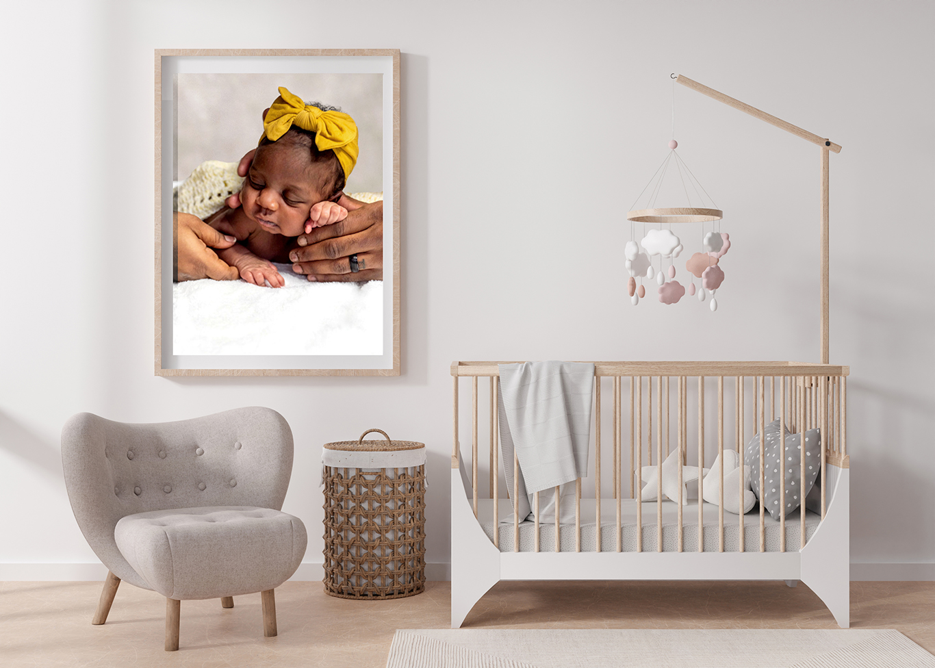 Baby nursery with newborn photography portraits in a frame